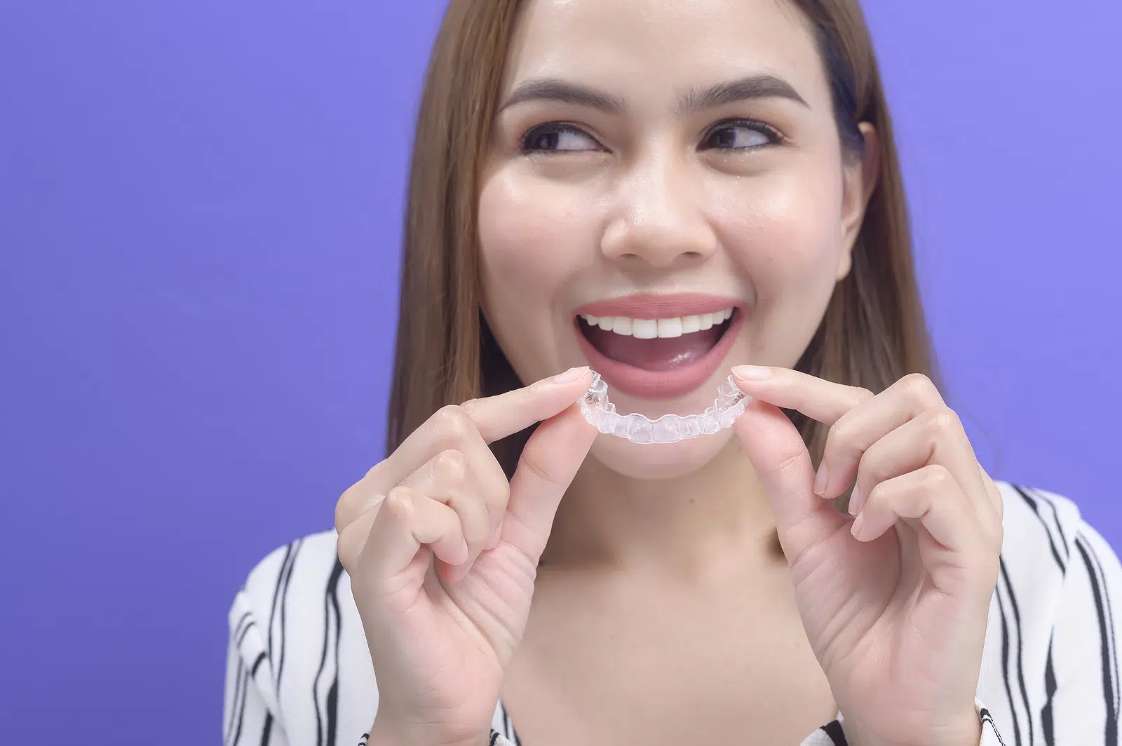 invisalign widen smile